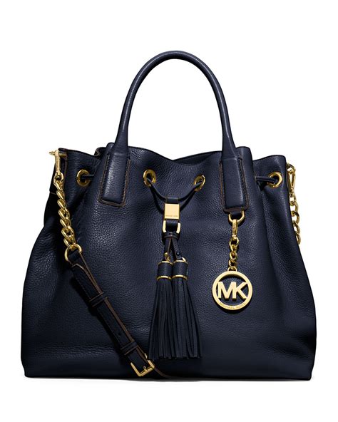 michael kors navy drawstring bag|Michael Kors drawstring front grommets.